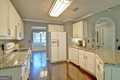 Make this charming home in the desirable swim and tennis - photo 17