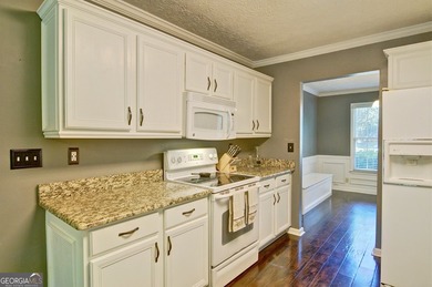 Make this charming home in the desirable swim and tennis - photo 18