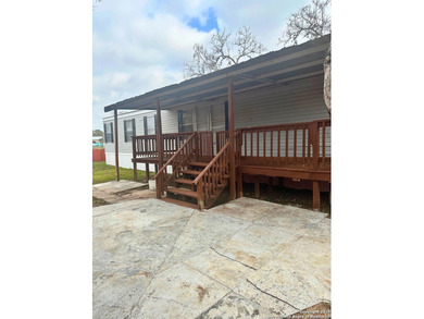 This beautifully maintained 2-bedroom, 2-bath home offers