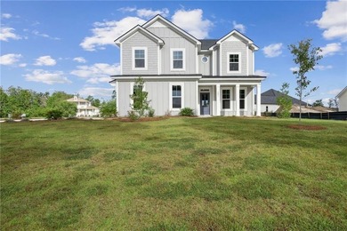 WELCOME HOME TO THE RICHMOND PLAN BY LANDMARK 24 HOMES! STEP - photo 5