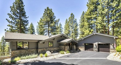 This distinctive home sits on 1.19 acres and offers lake views - photo 1