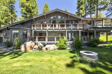 This distinctive home sits on 1.19 acres and offers lake views - photo 2