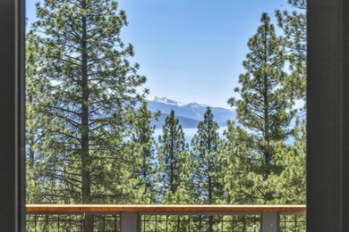 This distinctive home sits on 1.19 acres and offers lake views - photo 3