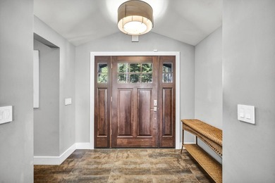 This distinctive home sits on 1.19 acres and offers lake views - photo 5