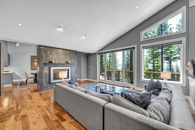 This distinctive home sits on 1.19 acres and offers lake views - photo 6