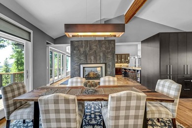 This distinctive home sits on 1.19 acres and offers lake views - photo 8