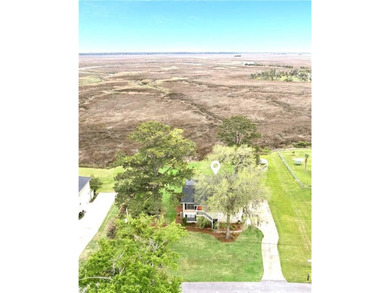 price drop! Reward yourself daily with these marsh views! This - photo 4