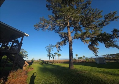 price drop! Reward yourself daily with these marsh views! This - photo 7