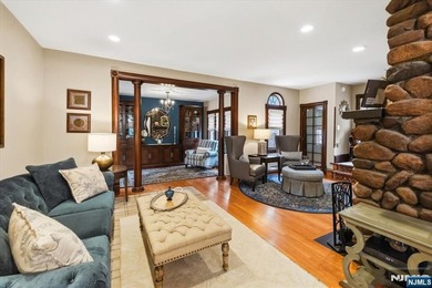 This home is gracefully positioned on a beautifully landscaped - photo 11