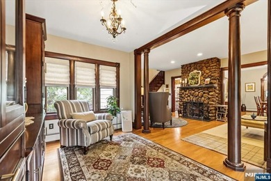 This home is gracefully positioned on a beautifully landscaped - photo 12