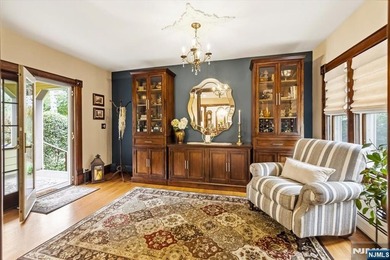 This home is gracefully positioned on a beautifully landscaped - photo 13