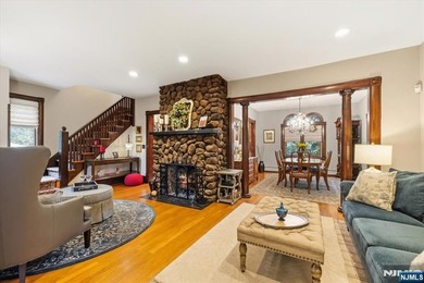 This home is gracefully positioned on a beautifully landscaped - photo 14