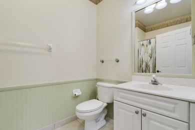 This spacious end-unit home is vacant and move-in ready! Tucked - photo 16