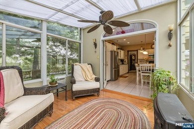 This home is gracefully positioned on a beautifully landscaped - photo 21