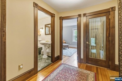 This home is gracefully positioned on a beautifully landscaped - photo 23
