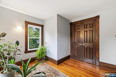This home is gracefully positioned on a beautifully landscaped - photo 25