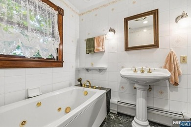 This home is gracefully positioned on a beautifully landscaped - photo 28
