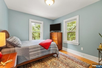 This home is gracefully positioned on a beautifully landscaped - photo 29