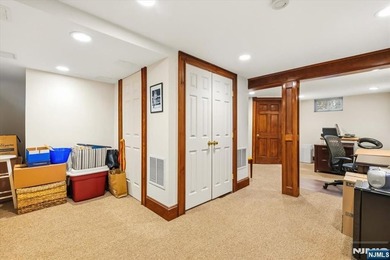 This home is gracefully positioned on a beautifully landscaped - photo 33