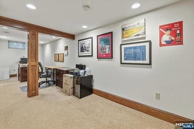 This home is gracefully positioned on a beautifully landscaped - photo 34