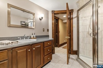 This home is gracefully positioned on a beautifully landscaped - photo 36