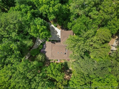 Experience elevated lake living in the gated golf and lake - photo 3
