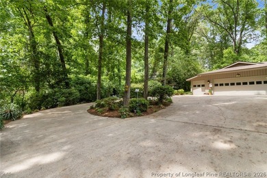Experience elevated lake living in the gated golf and lake - photo 8