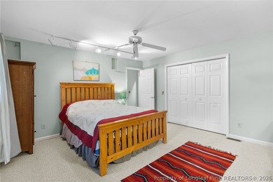 Experience elevated lake living in the gated golf and lake - photo 10