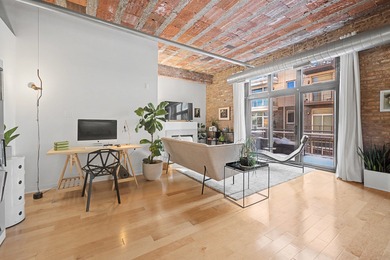 Welcome to this rarely available one-bedroom loft in the iconic