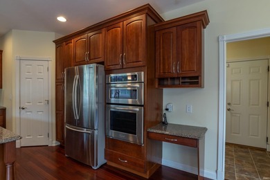 This beautiful Amber Ridge custom brick home on Bloomington's - photo 12