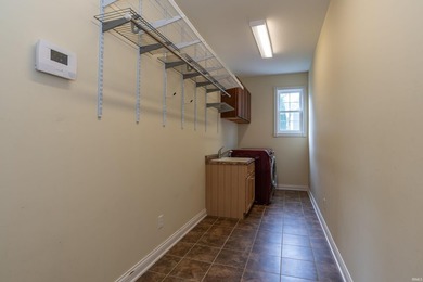 This beautiful Amber Ridge custom brick home on Bloomington's - photo 29
