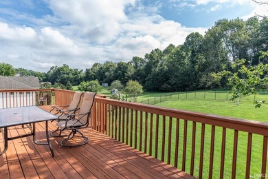 This beautiful Amber Ridge custom brick home on Bloomington's - photo 32