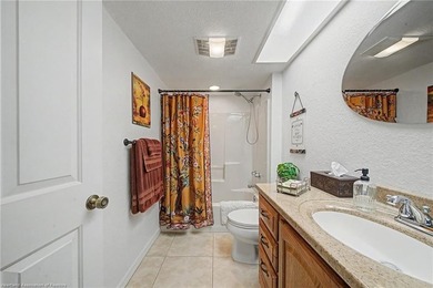 Immaculate Waterfront Living with Direct Lake Access! Nestled on - photo 32
