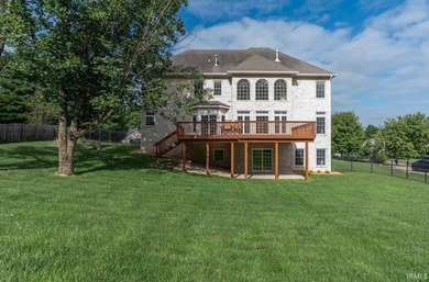 This beautiful Amber Ridge custom brick home on Bloomington's - photo 34