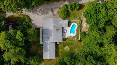 Situated on a one-acre lot along a private road, this - photo 40