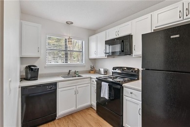 Discover this perfectly positioned condo offering the best of - photo 3