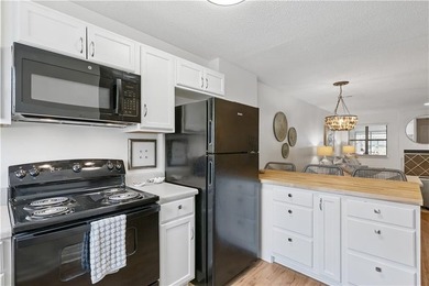 Discover this perfectly positioned condo offering the best of - photo 4