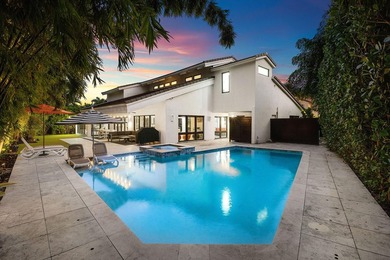 A refreshed two-story mid-century modern residence, this home is - photo 5