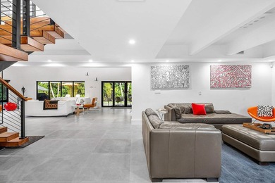 A refreshed two-story mid-century modern residence, this home is - photo 9