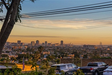 Perched in Signal Hill, this rare single-level 2-bed, 2-bath - photo 1
