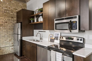 Welcome to Harvester Lofts, one of the most iconic residential - photo 11
