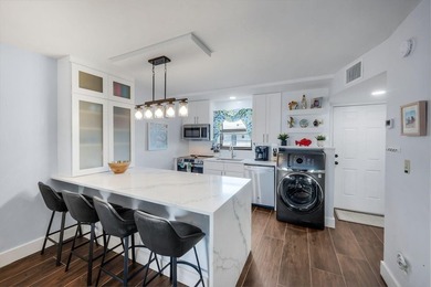 This completely renovated one-bedroom, one-bathroom condo at - photo 5