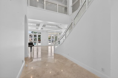 This striking coastal estate by renowned builder Terry Cudmore