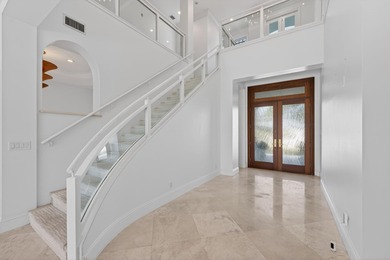 This striking coastal estate by renowned builder Terry Cudmore