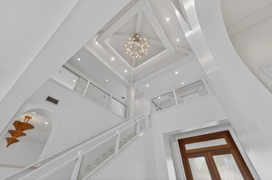 This striking coastal estate by renowned builder Terry Cudmore