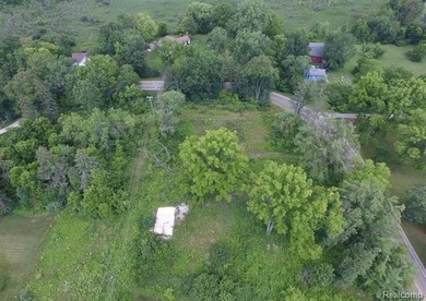 This 1.45 acre partially wooded parcel is located within minutes - photo 1