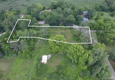 This 1.45 acre partially wooded parcel is located within minutes - photo 3
