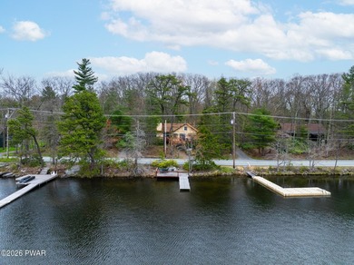 LAKEFRONT CHALET WITH A PRIVATE DOCK LOCATED IN A STR FRIENDLY - photo 3