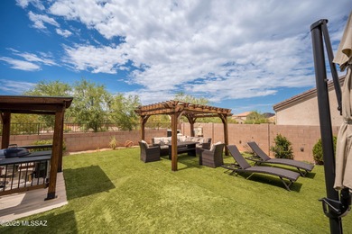 This gorgeous home is located the beautiful community of Saguaro