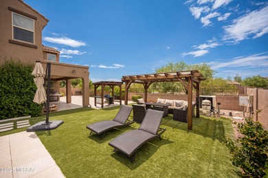 This gorgeous home is located the beautiful community of Saguaro